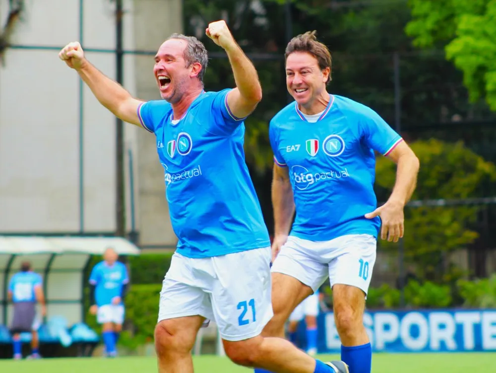 Fabio Brancatelli and Caio Ribeiro celebrating a goal, in Napoli shirts, at a match in São Paulo